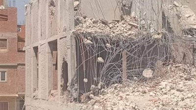 بالصور.. هذه تفاصيل إزالة 27  حالة بناء مخالف لفيلات وأبراج وعقارات بالجيزة