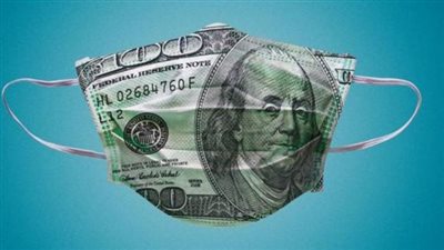 دولار كوفيد.. عملات خشبية تحمي من فيروس كورونا ..اعرف التفاصيل