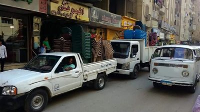 بالصور.. غلق وتشميع سنتر تعليمى وعدد 2 ورشة ورفع 358 حالة إشغال ببولاق الدكرور