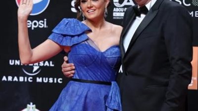 بشرى برفقة زوجها على الـ ”ريد كاربت” فى حفل ختام مهرجان الجونة السنيمائى