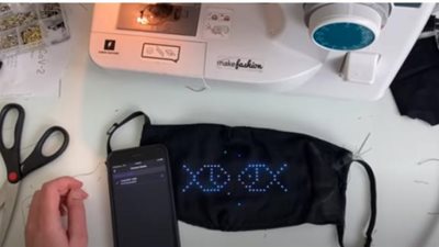 اضحك مع كورونا.. ابتكار كمامة جديدة بشاشة « LED»