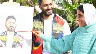 تامر حسنى يشارك جمهوره بصور من كواليس أغنية ”قد التحدى”