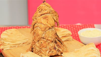 «زي المطاعم».. كيفية إعداد شاورما الفراخ على السيخ