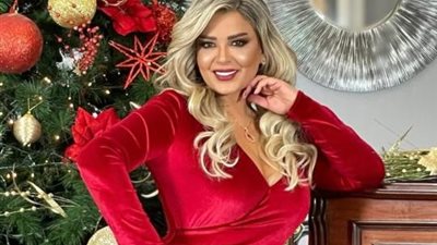 مادلين مطر تستعرض رشاقتها بفستان أحمر أنيق