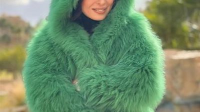 دينا تستعرض جمالها بجلسة تصوير شتوية