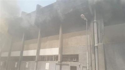 إنقاذ حافلة فريق الكرة بالأهلي من آثار حريق مدرج التتش