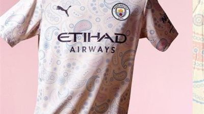 بالصور.. السيتي يكشف عن القميص الثالث للفريق
