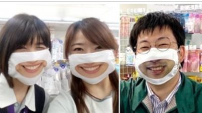 آخر تقاليع كورونا.. طبع ابتسامة الموظفين على «الكمامات»