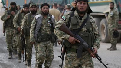 فصائل سورية مدعومة من تركيا تشن هجوما على بلدة عين عيسى و قسد ترد