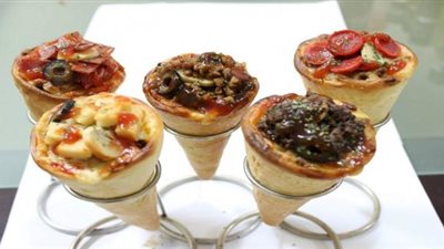 «زي المطاعم».. طريقة سهلة لإعداد «بيتزا كونو» في المنزل