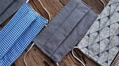 الحكومة تكشف موعد توفير الكمامات القماش