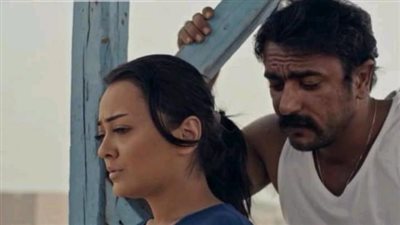 شاهد.. راندا البحيري وأحمد العوضي في كواليس تصوير فيلم ”أسوار عالية”