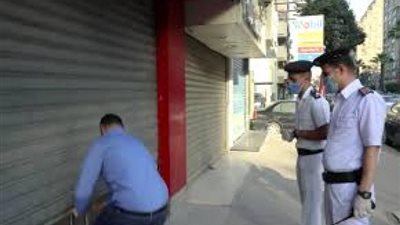 حملة مكبرة بالدقى لمتابعة الإجراءات الاحترازية لمواجهة كورونا