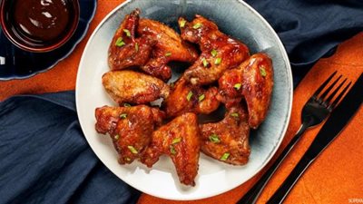 انتبه.. أضرار خطيرة  عند تناول أجنحة الدجاج