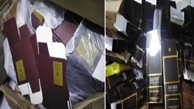 مباحث القاهرة تضبط صاحب مركز لتعبئة العطور المقلدة بالموسكى