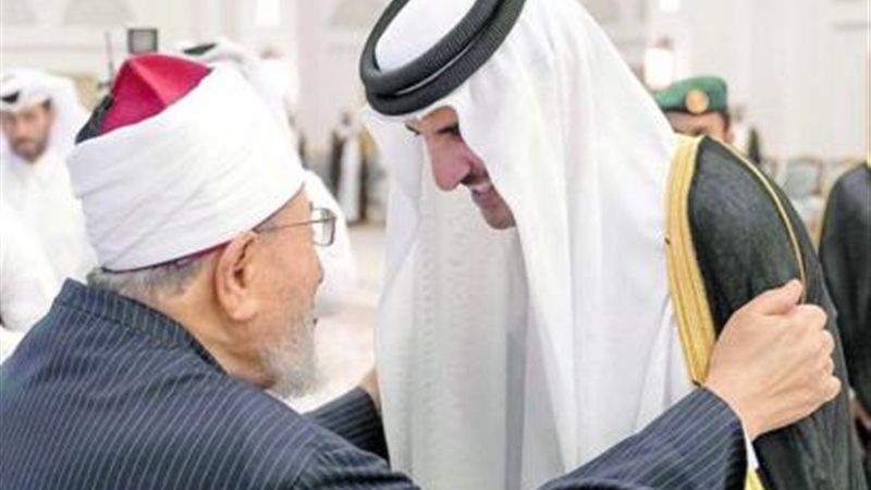 تميم و القرضاوي