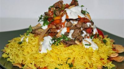 على طريقة الشيف شربيني.. كيفية تحضير عيش فتة الشاورما