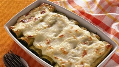 دلعي أطفالك بالأكلات الإيطالية.. أسهل طريقة لتحضير الكانيلوني في المنزل 