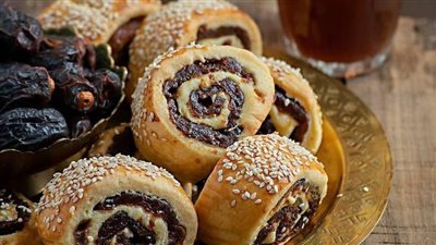 طريقة عمل المنين بالعجوة.. كيفية تحضير ألذ المخبوزات بالمنزل 