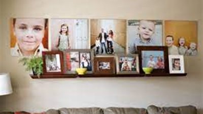 الافتاء توضح.. حكم تعليق صور المتوفى للتماس الدعاء له بالرحمة