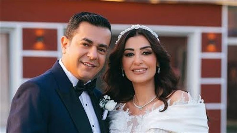 ريهام عياد وزوجها