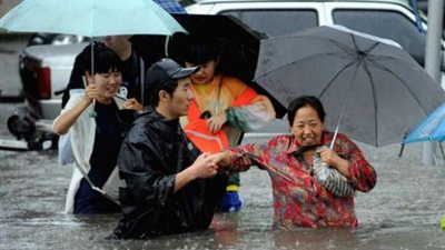 مصرع وفقدان 25 صينيا جراء الأمطار الغزيرة فى الصين