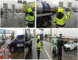 رجال الشــرطة يواصلون مساعدة المواطنين لمواجهة موجة الطقس السيئ